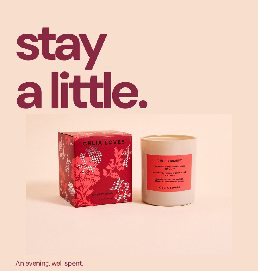 Example product page visual: a red candle and gift box on a cream plinth